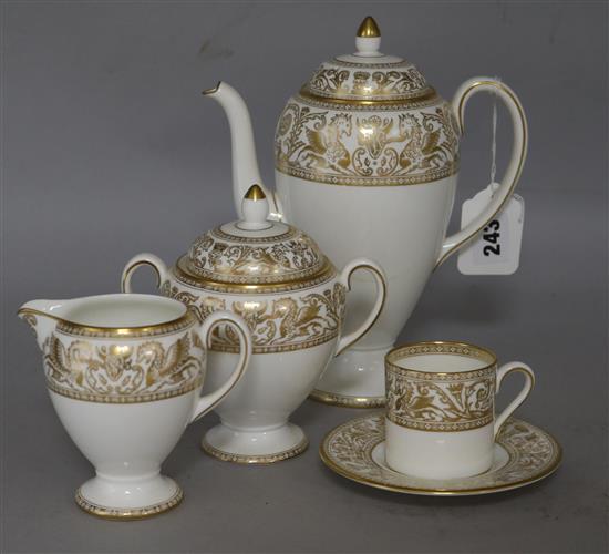 A Wedgewood gold florentine coffee set